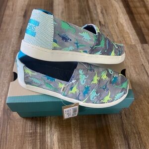 TOMS Kids' Youth Alpargata Blue Glow in the Dark Dinosaur Fossil